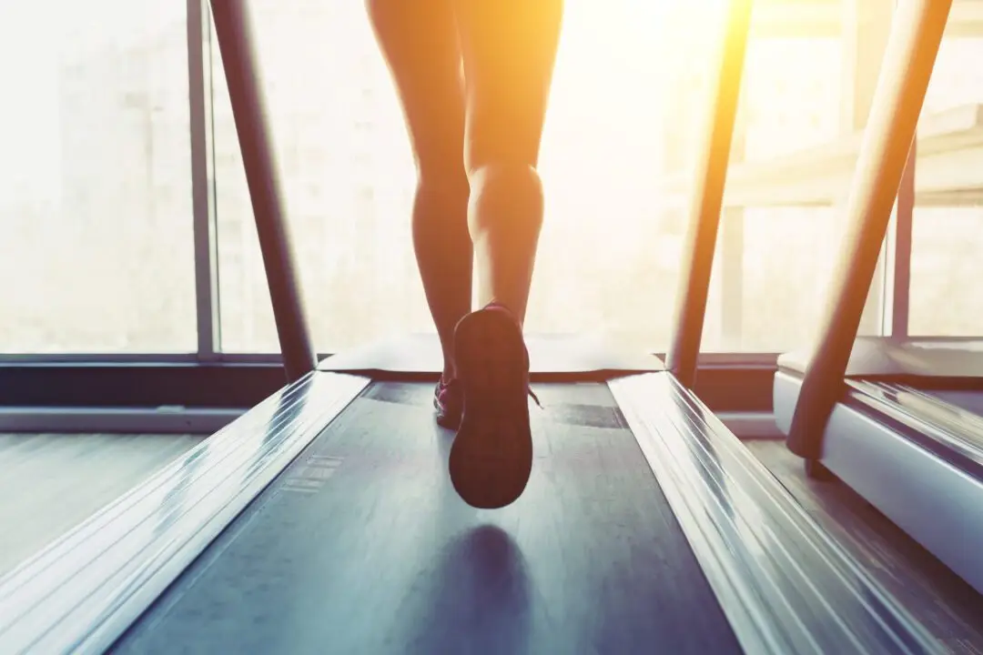 fitness girl running on treadmill